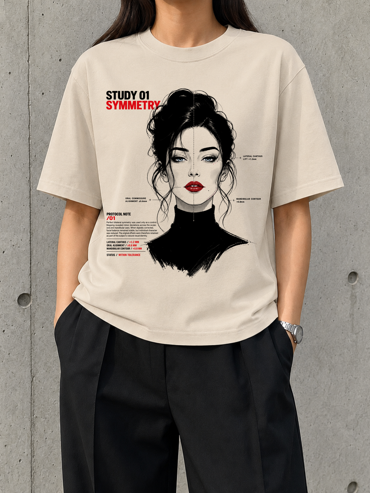 Symmetry, Study 01 heavyweight boxy tee worn by a woman, front print of a monochrome portrait split down the middle
